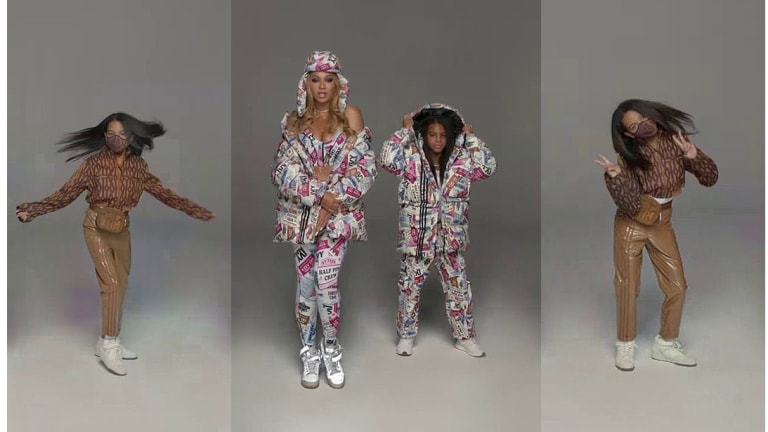 lake extent beside Blue Ivy Carter in "Icy Park" Adidas x Ivy Park teaser - UPTOWN Magazine