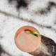 Ingredients:2 parts Plume & Petal Peach Wave½ part lemon juice½ part honey1 dash Angostura bittersGarnish: lemon wheel and rosemary sprigGlass: RocksDirections: Combine all ingredients with ice. Shake and strain over fresh ice in a rocks glass