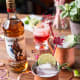 Ingredients:1.5 oz Captain Morgan Spiced Rum2 oz ginger beer2 oz cranberry juiceGarnish: cranberries and limeDirections: Combine Captain Morgan Original Spiced Rum, ginger beer, and cranberry juice in a copper mule mug over. Top with ice and garnish with fresh cranberries and lime.