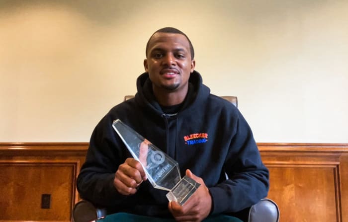 Deshaun Watson accepts the Faith in Action Award during the Super Bowl Gospel Celebration.