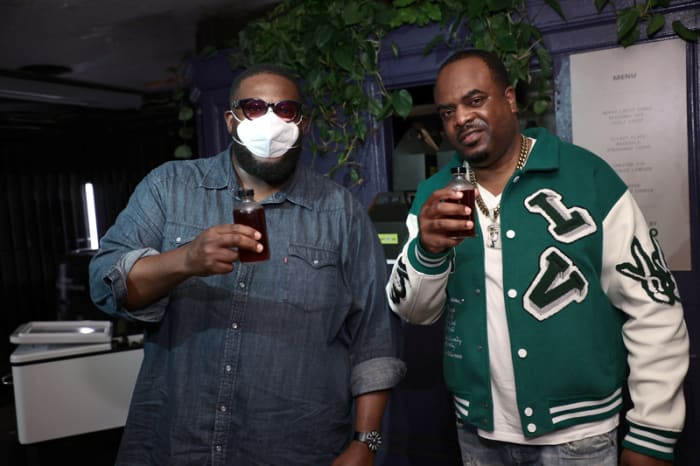 Markuann Smith (R), executive producer of Godfather of Harlem, and guest attend the launch of Timberland's GreenStride collection.