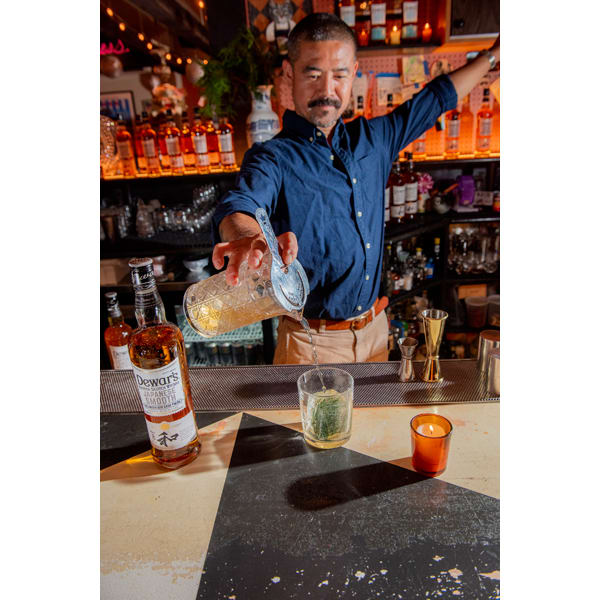 Masahiro Urushido pours a Hakuba, one of his Dewar's Japanese Smooth cocktails, at Katana Kitten.
