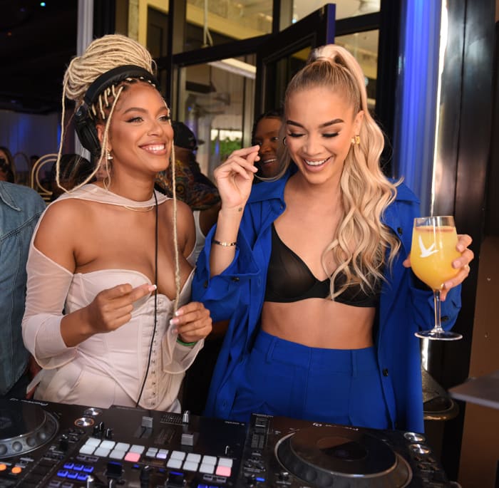 Jasmine Sanders tries her hand at spinning with DJ Millie
