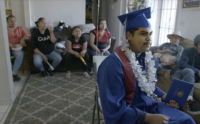 Denilson Garibo attends Oakland High School's 2020 graduation, virtually in this still photo from Homeroom.