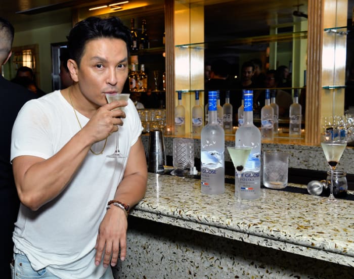 Prabal Gurung sips on a martini at his Spring 2022 collection private after-show dinner with GREY GOOSE vodka on September 8, 2021.