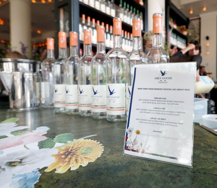 Motivated by the parts of ourselves that make us us, guests identified their essence and celebrated with matching cocktails in either the Watermelon & Basil, Strawberry & Lemongrass, or White Peach & Rosemary Grey Goose Essences flavors, taking photos in front of the custom flavor-inspired walls covered in fruits and botanicals.
