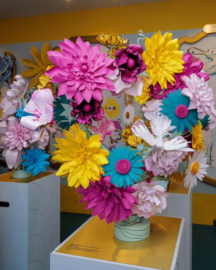 Zoe Bradley's paper floral sculptures with Jameel Mohammed's floral prints in the background